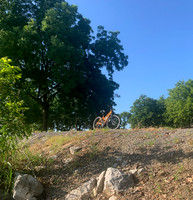 Mountain Bike on a hill in the distance