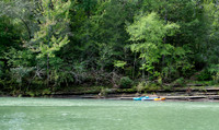Kayaks and raft on the shore of the Buffalo River, Arkansas