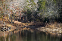 Winter landscape with water and reflections