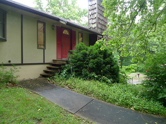 Ramp and steps to front entry