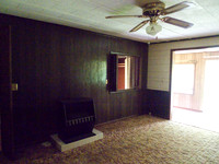 Living room. Tim thought the stove is electric