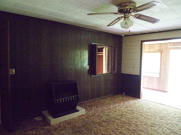 Living room. Tim thought the stove is electric
