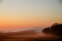 Sunrise in eastern oklahoma, a bridge disappears into the fog