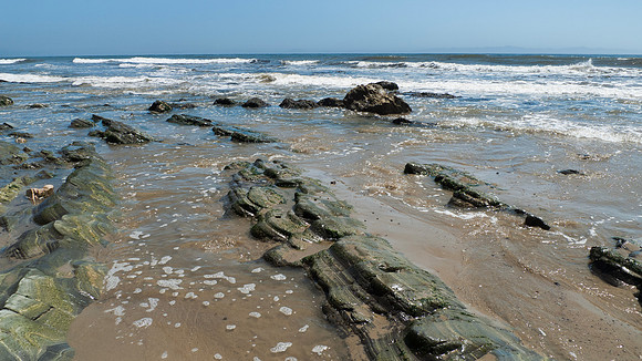Arroyo Burro Beach, Santa Barbara, features rocks in the sand