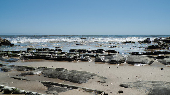 Arroyo Burro Beach, Santa Barbara, features rocks in the sand