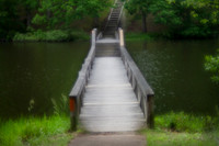 Footbridge across the water with stairway