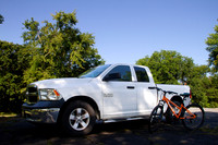 Mountain Bike on a hill in the distance,, copy space in sky