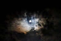 Full moon astral sky with colorful clouds