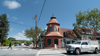 Solvang, California street corner with vehicle and pedestrian
