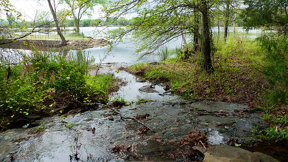 A stream empties into the lake at Shoal Bay
