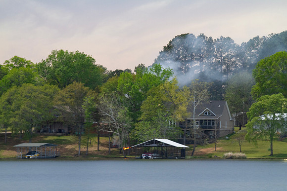 A fire across the lake during the eclipse