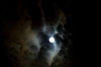 Full moon with clouds in an eerie sky