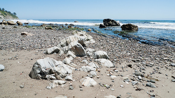 Arroyo Burro Beach, Santa Barbara, features rocks in the sand
