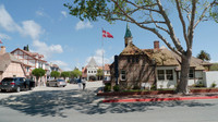 Tourists walk along the tourist town of Solvang, California